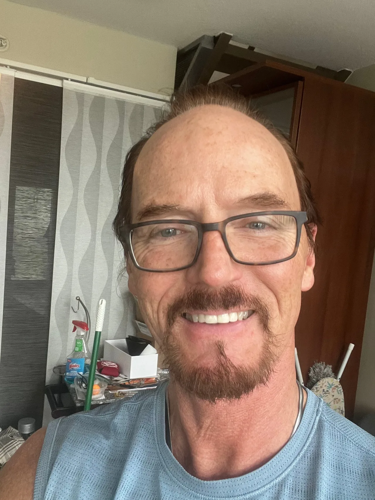 Archer Jensan, Vestta’s health consultant, smiling and wearing glasses